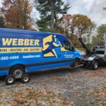 Flatbed towing a box truck in Putnam Valley, NY