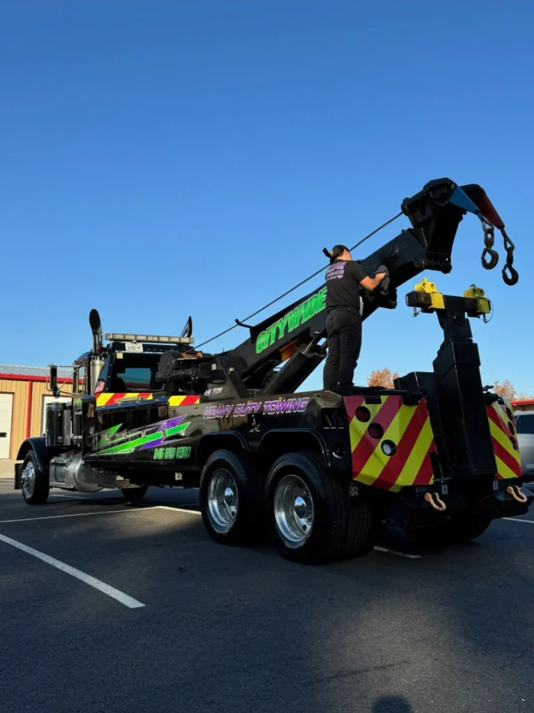 Citywide Automotive 45-ton heavy-duty wrecker with an operator working the boom